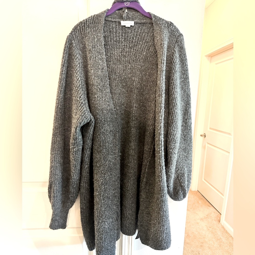Sweater jacket long. Top shop. Has a belt as well.